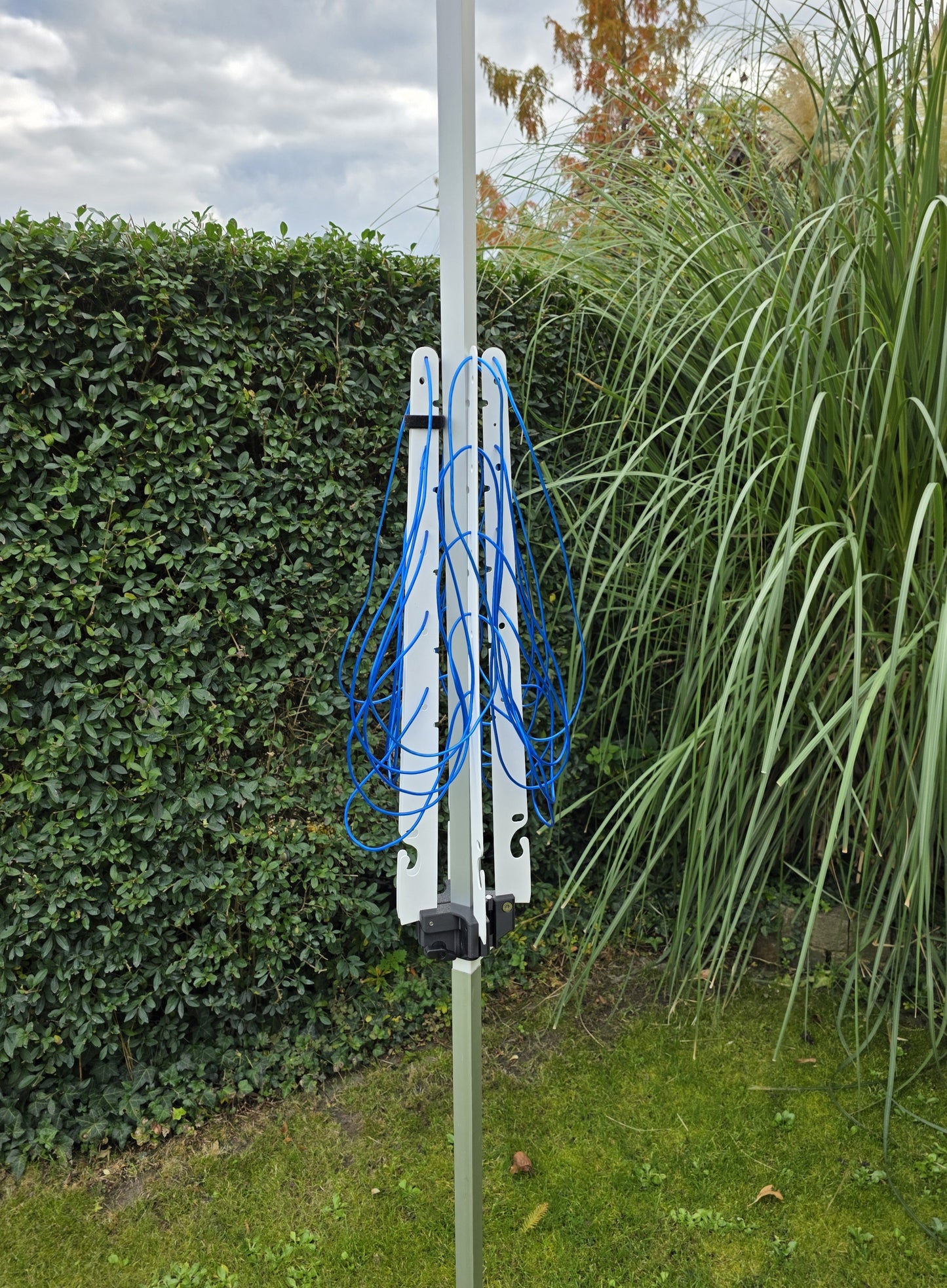 Markisen-Butler - Wäschespinne am Stellfuß der Markise